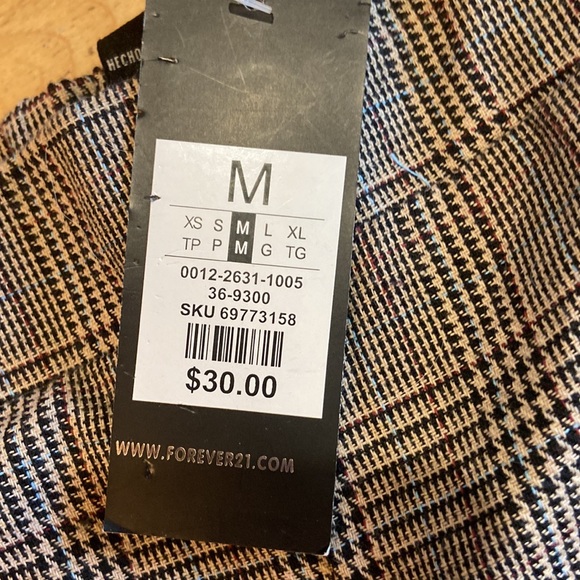 Forever 21 wide leg checkered brown tan pants with slit at bottom. - Picture 3 of 3